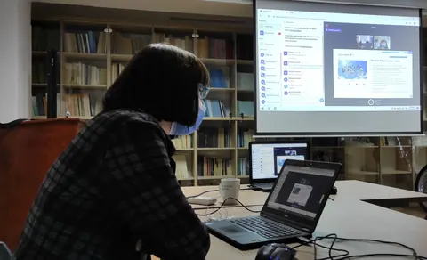 Dragana Maslovar attending the EXCHANGE launching event in person in Kotor, connected with project partners through the webinar platform.